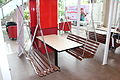 Swing seats in Pekanbaru, Indonesia. Marrybrown has designated a portion of their seating as swing seats since 1996