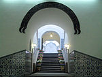 Inside the main entrance, the title granted to Macau by King João IV is displayed.