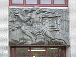 A stele on the facade of Remsen Hall.