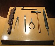 Various tools for making batik, canting is shown in the top.