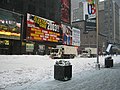 Garbage trucks fitted with snowplows in New York City