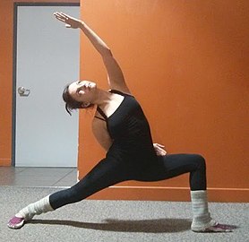 Reverse Warrior Pose, Viparita Virabhadrasana, a modern variant of Virabhadrasana II[21]