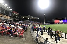 Fans walk and settle into their seats at Whitten Oval