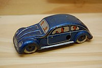 1940 KDF-wagen (Volkswagen Beetle) tin-plate toy, by the Nuremberg toymaker Georg Fischer, displayed in the Museum der Arbeit, Hamburg, Germany