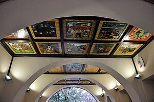 There are 25 pictures tell some stories about the history, traditions, costums, culture and the holidays of Veresegyhaz, a nice town in Hungary. This art of work is on the ceiling of one passage in the arcade of Main-square, Veresegyhaz. The area of it is 20 square metres