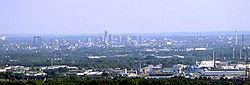 View over the center of Essen from the "Tetraeder" landmark in Bottrop. In the background the Ruhr Heights.