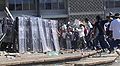 Image 32Riot police and protesters during the unrest in 2005. (from History of Belize)