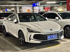 Front three-quarter view of a front-engined four-door car.