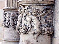 Putti on sculptural columns on the Hotel Russell facade