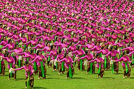 Balinese Tari pendet, performed by hundreds of dancers.