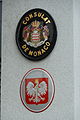 The coat of arms of Poland in Vaduz. Poland was using golden paint (like Monaco) over its metal plates till 1939; later, during the communist era, paint was changed to yellow