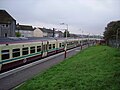 Drumgelloch station, looking towards Airdrie station, with a Class 334 departing