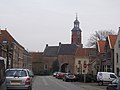 The Culemborg gate with the Saint-Lambertus church (Buren) in the background.