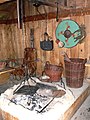 Fire pit with sign on the wall.