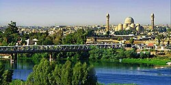 Tigris, a bridge and Grand Mosque in Mosul