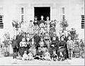 Pontic Greek family in the courtyard of a Trapezounta house in (modern Trabzon, Turkey).