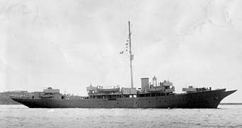 Sea Cloud with masts removed and camouflaged in grey for Coast Guard service