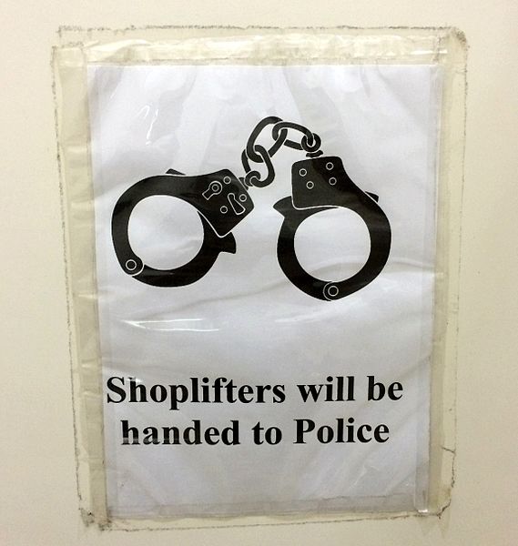 File:Shoplifting sign cuffs1.jpg