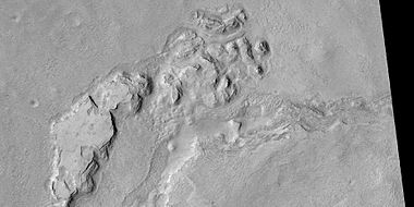 Wide view of mesas that are forming fractures, as seen by HiRISE under HiWish program