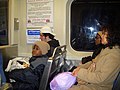 Passengers aboard a Market–Frankford Line train.