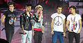 English-Irish boy band One Direction in concert, 2013.