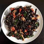 A dish made of squid ink pasta