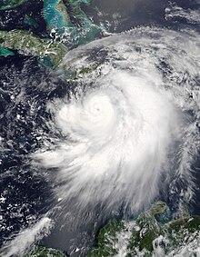 Satellite image of a Category 2 hurricane intensifying in the Jamaica Channel