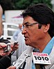 "Colour photograph of Ovide Mercredi, former national chief of the Assembly of First Nations speaking to the press."