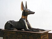 The Anubis Shrine; 1336–1327 BC; painted wood and gold; 1.1 × 2.7 × 0.52 m (3 × 9 × 1.6 ft); from the Valley of the Kings; Egyptian Museum (Cairo)