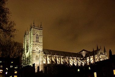 At night, from Dean's Yard to the south; artificial light highlights the flying buttresses