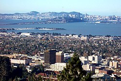 Downtown Berkeley viewed from the Berkeley Hills in December 2005, with the San Francisco-Oakland Bay Bridge and San Francisco in the background