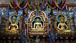 Golden statues of Gautama Buddha, Padmasambhava and Amitāyus