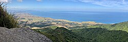 Ruapuke from Karioi summit, with Aotea Harbour and Albatross Point beyond