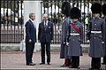 Prince Philip, Duke of Edinburgh and George W. Bush in the forecourt of Buckingham Palace before a review of Foot Guards of the Household Division, 2003.