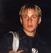 A close-up picture of a blonde-haired man