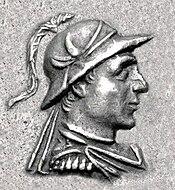 Indo-Greek king Hermaeus wearing a similar helmet, depicted on one of his silver coins; c. 90–70 BC.