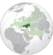 A map of Europe, Africa, and Asia contrasting the Indo-European homeland and the current dispersal of modern languages in differing shades of green