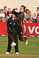 Jim Allenby bowling; he must ground some part of his foot behind his popping crease and within the return creases for the ball to be a legal delivery. As a member of the fielding side, he can also attempt to run out a batsman by breaking the stumps with the ball before the batsman manages to return to the popping crease.[4][5]