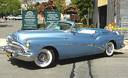 1953 Buick Skylark in side view. Note door dip and chopped top.