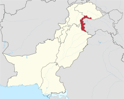 Azad Jammu and Kashmir (AJK) is shown in red. Pakistan and the Pakistani-controlled territory of Gilgit–Baltistan are shown in white.