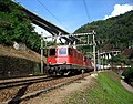 An Re 420 and Re 620 lead a freight train down the Gotthard route