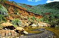 A creek rich in metal oxydes in the south of Grande Terre.