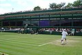 Image 38Sébastien Grosjean takes a shot on Court 18 during the 2004 Championships. (from Wimbledon Championships)