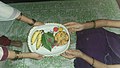 Women celebrating their divinity by gifting Kosambri with turmeric, kumkum, betel leaves, betel nut and bananas.