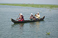 Villagers using a country boat