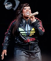 A woman holding a microphone