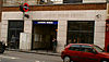 A single storey stone and glass building with "London Bridge Station" incised into the stonework above the entrance