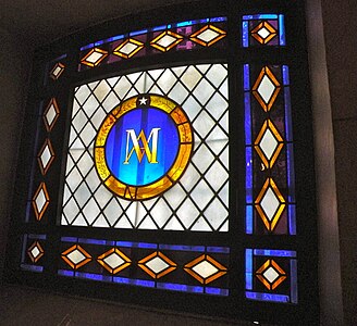 The single window of the Memorial Chapel, with initials of Marie Antoinette