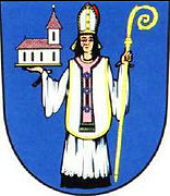 Saint Wolfgang holding a church model with an adze lodged in the roof (Coat of arms of the Czech municipality Hnanice).