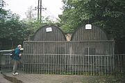 The macaque enclosure at Zigong People's Park Zoo, Sichuan, China, shows that small and close cages are still in use